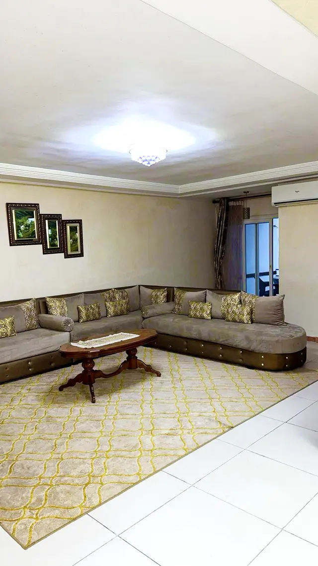Living space inside HiTanger Downtown Gem near Hilton and Tangier Ville station.