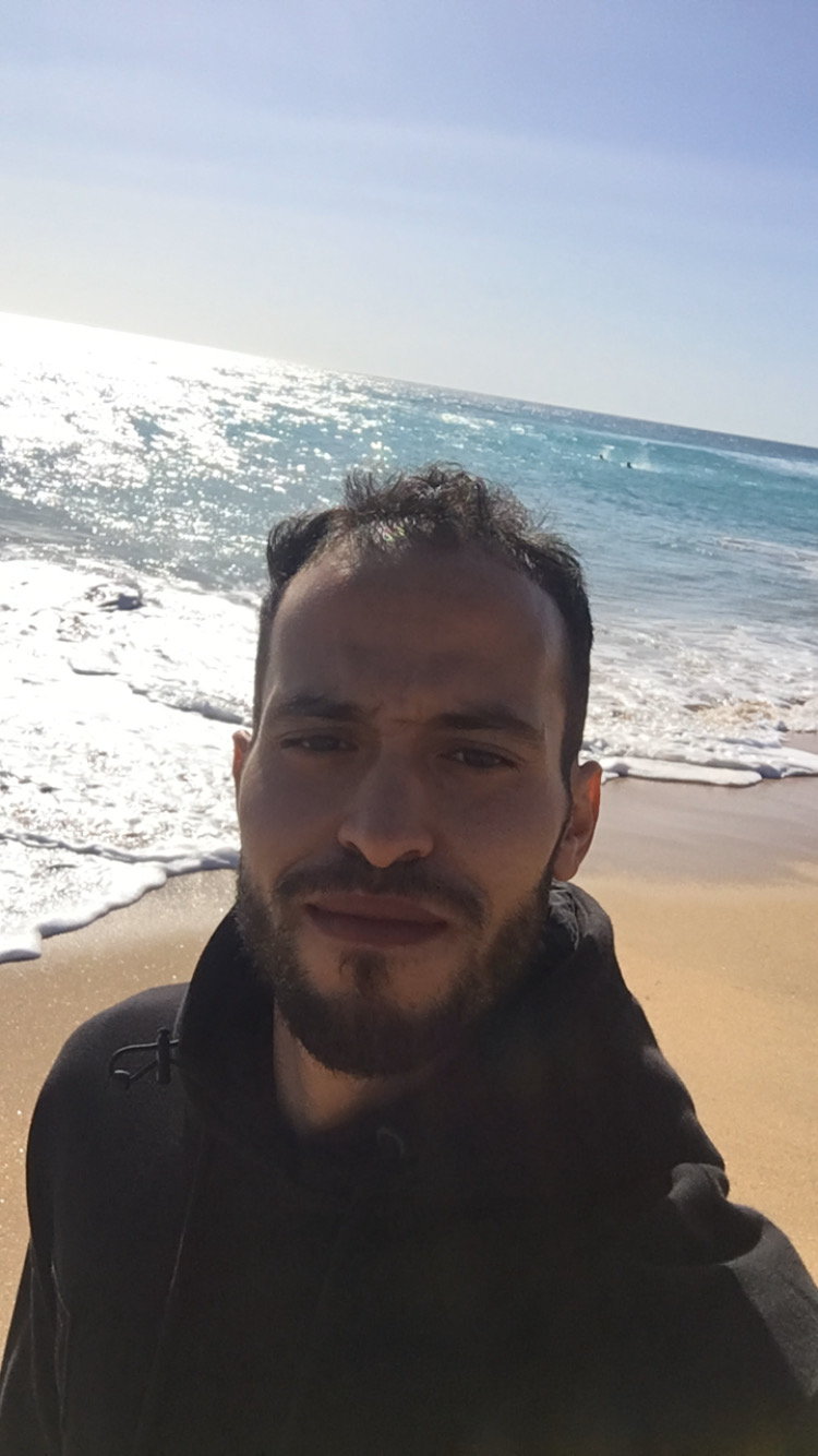 Host portrait by the Tangier coast.